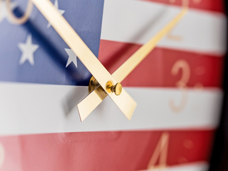 USA patriotic clock with golden clock hands